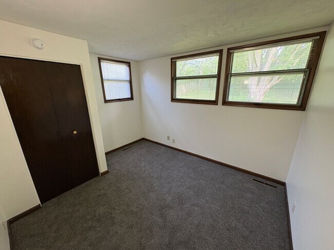 Building Photo - Spacious Home with Attached Garage & Fenced Backyard