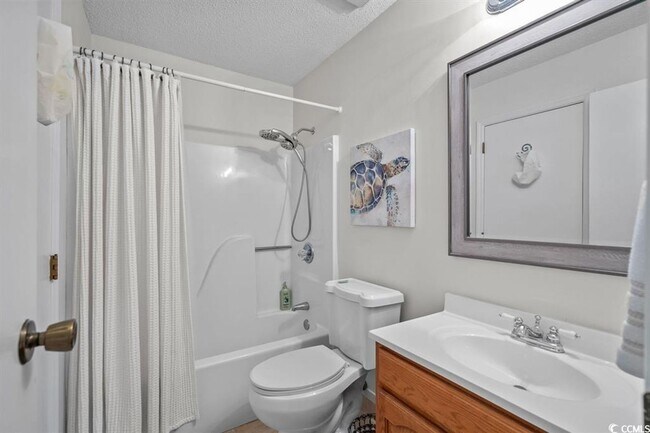 Building Photo - Ground floor, 2 bedroom, 2 bath, end unit- 10 mins to Surfside Beach.