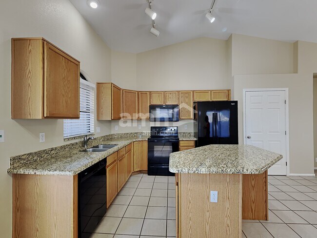 Building Photo - 8746 W Cherry Hills Dr