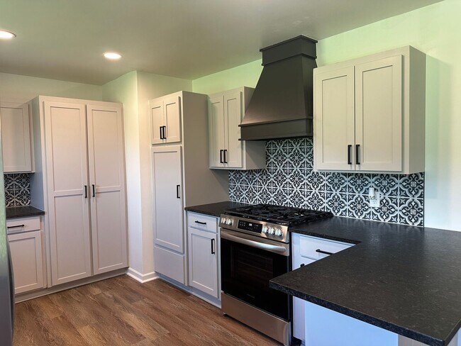 Building Photo - Welcome to country living with a fresh, modern twist.