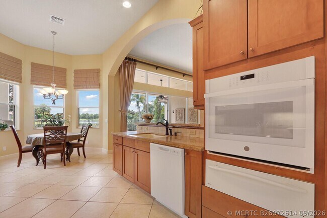 Building Photo - 9885 SW Torriente Ln