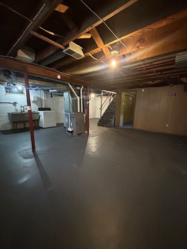 Building Photo - Bright Cape w/ Sunroom, Central Air, Big Basement & Backyard Shed