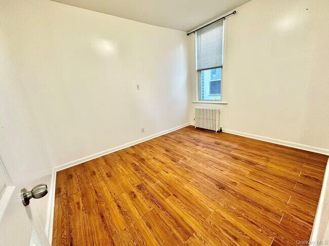 Building Photo - 18-17 125th St
