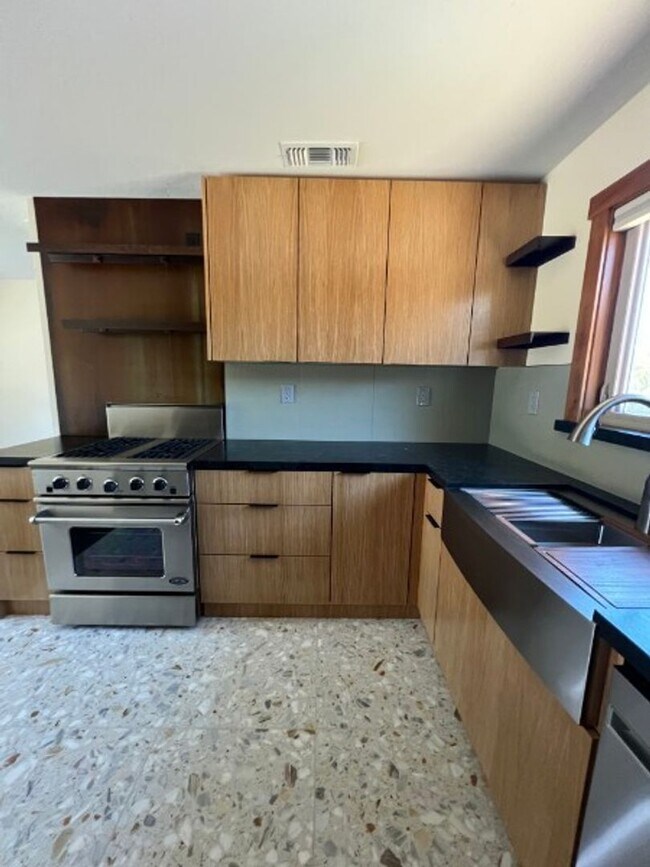 Building Photo - Artisan-Built Custom Cottage Retreat | Private Yard, Garage & EV Charging Ready