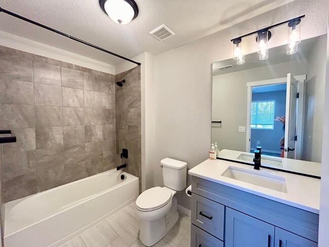 Building Photo - Impressive 4 Bedroom Townhome Nestled in M...