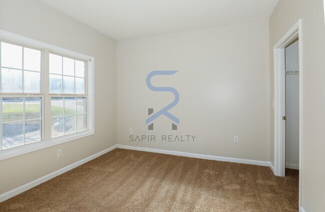 Building Photo - Move in before January 31st and choose your reward: a $250 Amazon Gift Card or a 55" Smart TV!