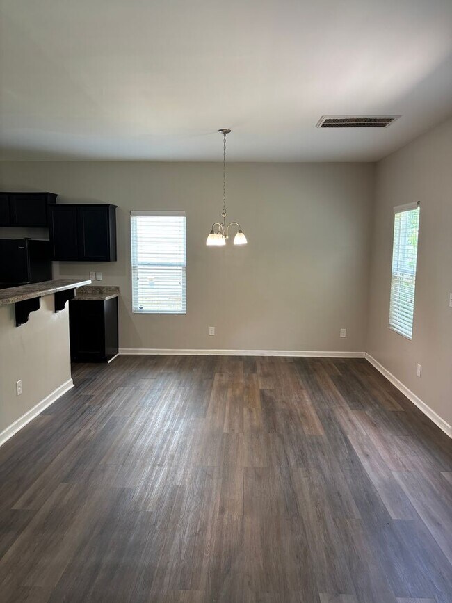 Building Photo - Four Bedroom Home In Mineral Springs/Unive...