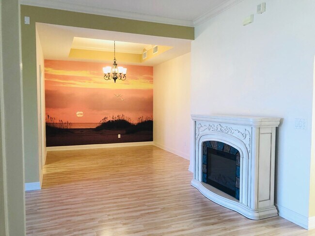 Building Photo - Experience Bell Tower Park. GATED ground floor 2 Bed 2 Bath Den 1 Car Garage Condo.