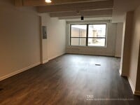 Building Photo - HUGE DUPLEX DOWN condo-quality 2 Bed/2.5 bath In the heart of Wrigley!