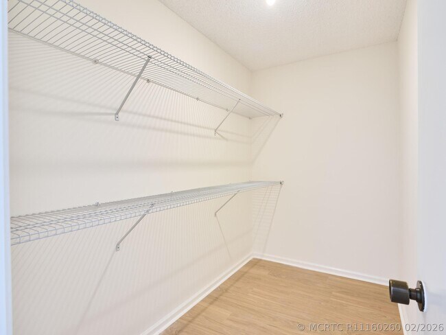 Building Photo - 5250 Woodland Lakes Dr