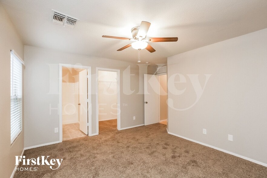 Building Photo - 8338 W Hughes Dr