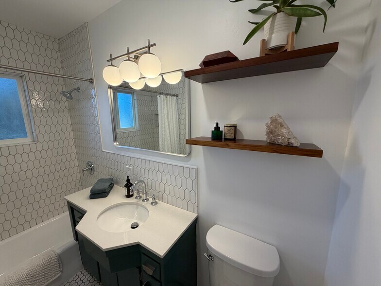New tiled shower and Moen fixture - 2101 Laverna Ave