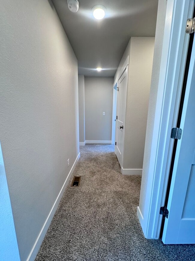 Building Photo - Sage Meadows II Townhomes — Lakeside Living Meets Modern Comfort!