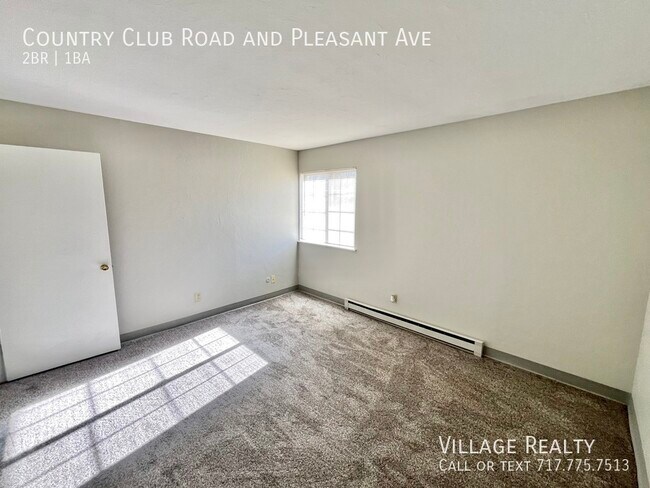 Building Photo - 605 Country Club Rd