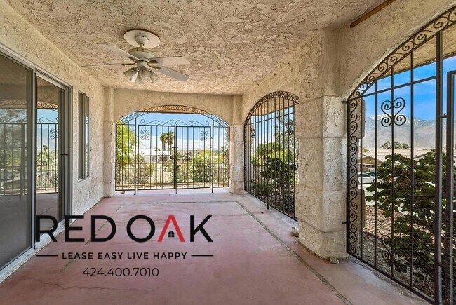 Building Photo - Spectacular Spanish Style Three Bedroom Fe...