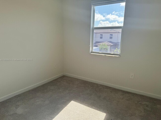 Building Photo - 26459 SW 149th Ave
