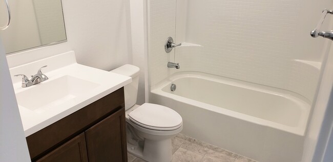 Building Photo - The 2 YEARS NEW 4 bedroom + 3 car garage r...