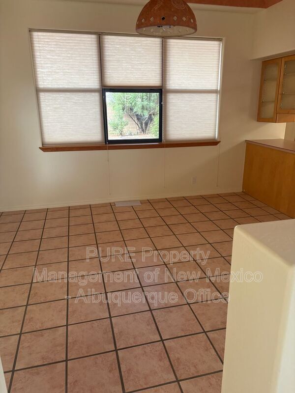 Building Photo - 8220 W Raintree Dr NE
