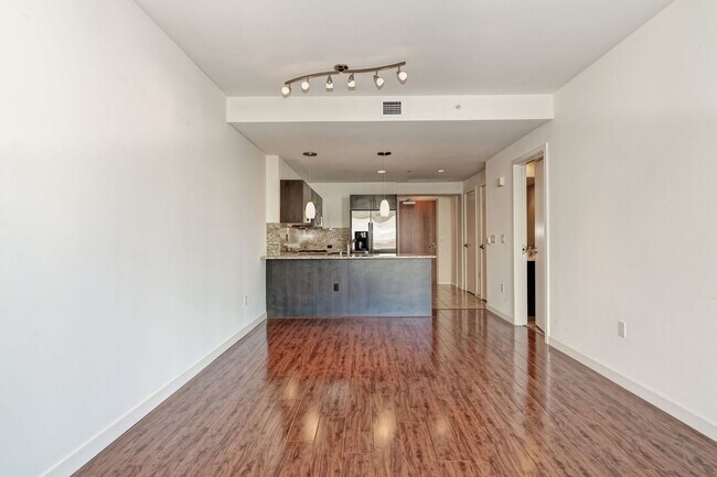 Building Photo - Modern Downtown Condo in Premier High-Rise...