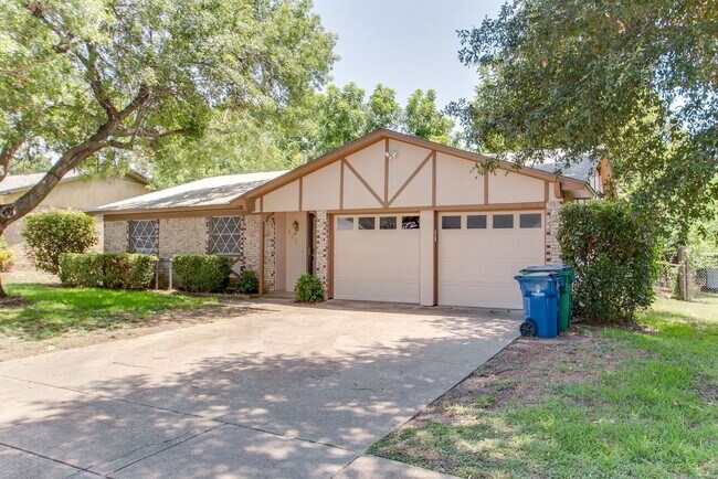 Building Photo - No Carpet! Great tree shaded yard!