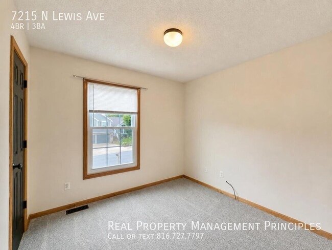 Building Photo - 7215 N Lewis Ave