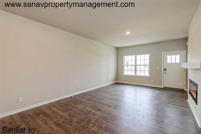 Building Photo - Modern Charm: 2-Bedroom, 2-Bathroom Home with Open Floor Plan and Rear Load Garage