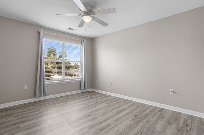 Building Photo - Welcome to Harbor Landing Condominiums — where coastal living meets convenience!