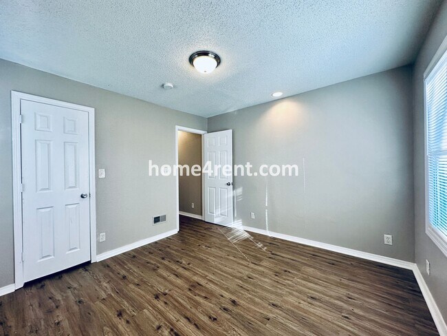 Building Photo - Adorable Home Featuring Wood Floors, SS Ap...
