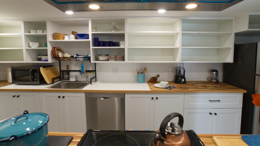 Lots of pantry shelves, drying rack over the sink and new dishwasher - 4157 SE Brooklyn St