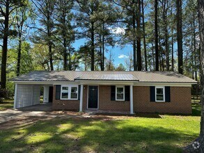 Building Photo - 3 Bedroom Home with Wooded Lot