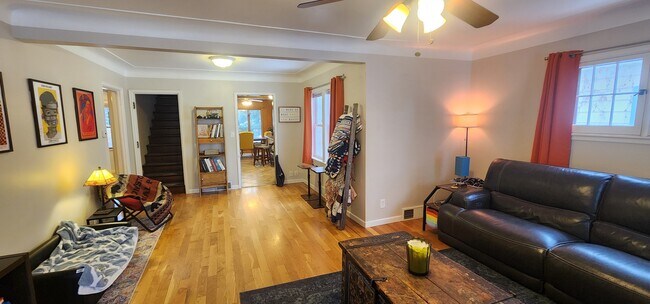 Spacious living room offering flexible furniture layout options. - 2923 Arthur St NE