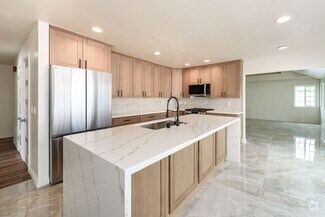 Building Photo - Your Newly Renovated Huntington Beach Oasi...