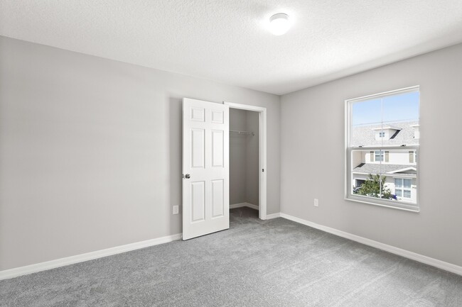 Building Photo - 4/2.5 Beautiful Energy Efficient Townhome ...