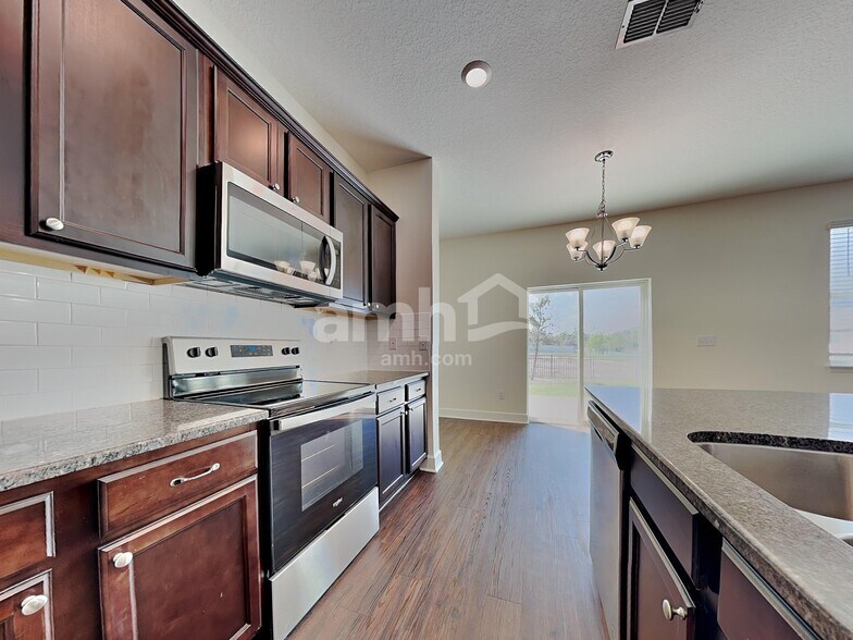 Building Photo - 11205 Delicate Rose Ct