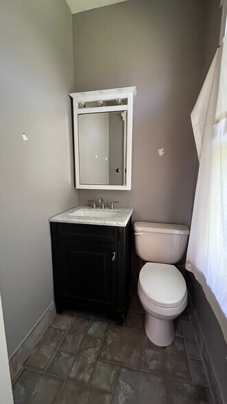 half bath off of living room - 2366 E 85th St