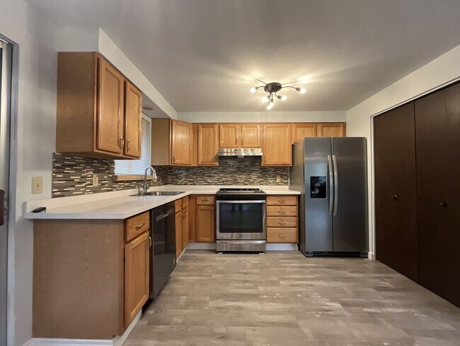 Building Photo - Single-Level 3-Bedroom Home with 2-Car Garage, Mini-Split AC, & Backyard Garden Space