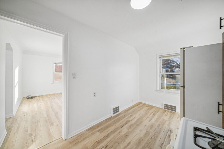 Kitchen with living room view - 16079 Forest Ave