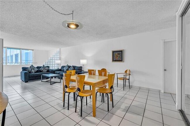 Building Photo - 5005 Collins Ave