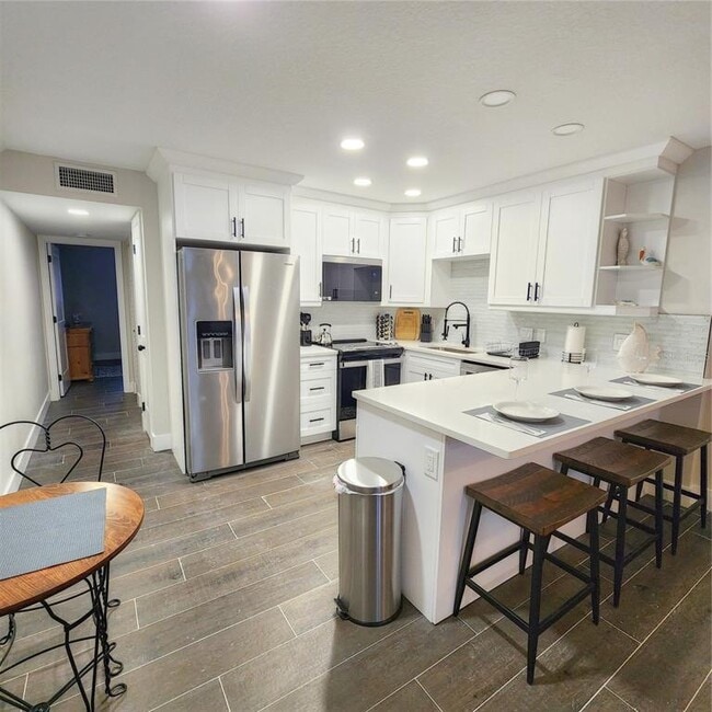 Building Photo - 8535 Blind Pass Dr