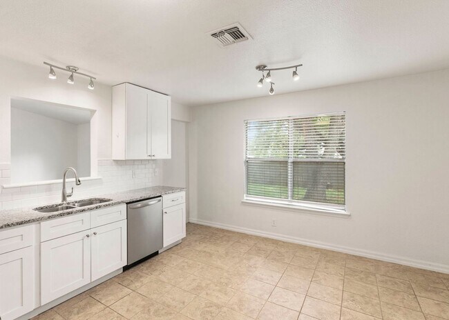 Building Photo - Move-In Ready Contemporary Gem on Treed Co...