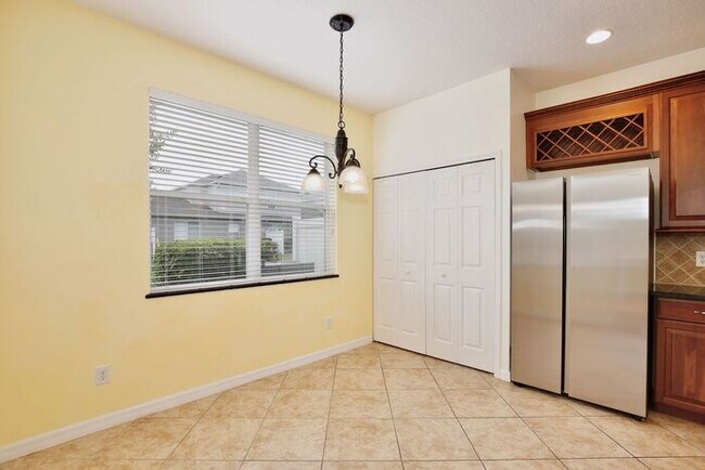 Building Photo - Luxury 3BR/3BA Townhome with 2-Car Garage in Gated Greystone – Sanford