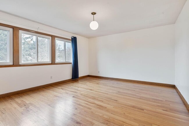 Building Photo - Beautiful, modern 4-bdrm/2-bath home in Concordia—Private, urban sanctuary w/ flex spaces