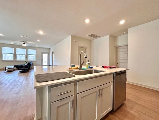 Building Photo - Light-Filled 4 Bedroom, 2 Bath Home with Deck & Fenced Backyard