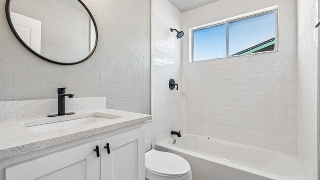Building Photo - Charming 3 Bedroom Home +BONUS Room with Spacious Backyard