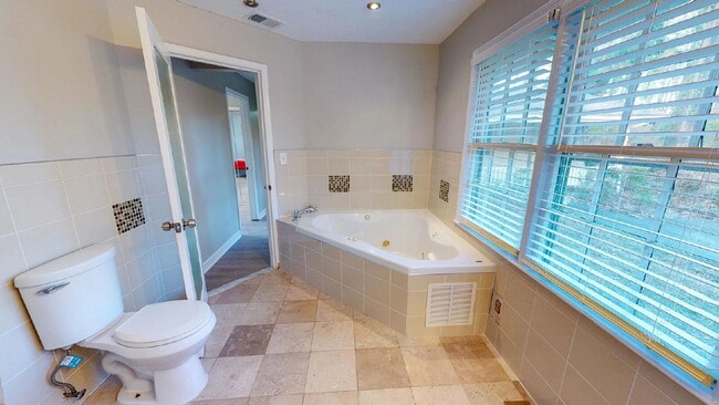 Building Photo - THE UNION GROVE | Gorgeous renovated home in Lithonia featuring large common areas, a spacious ki...