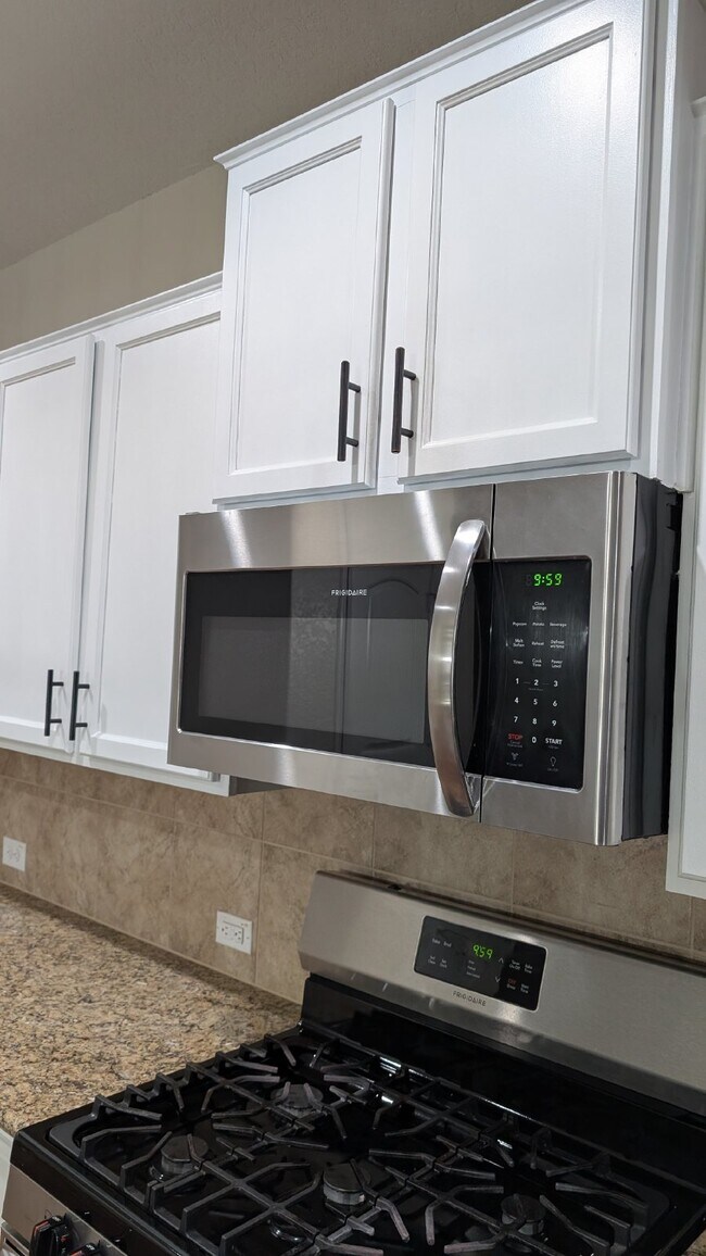 Building Photo - "Charming 4-Bedroom Oasis with custom fini...