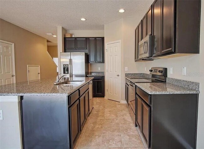 Building Photo - 7026 Woodchase Glen Dr