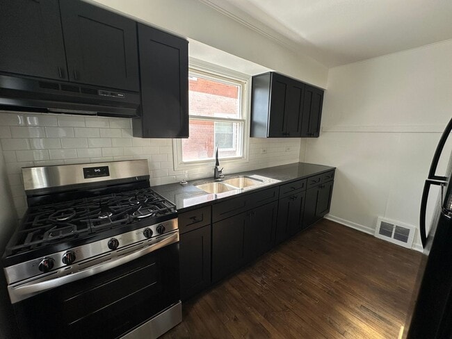 Building Photo - FREE APPLICATION!! Beautiful 4 bedroom house in great Dolton neighborhood w/ Huge Back Yard!