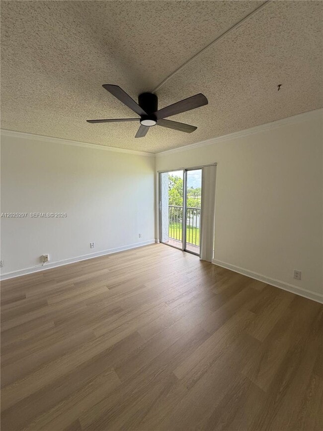 Building Photo - 8560 N Sherman Cir