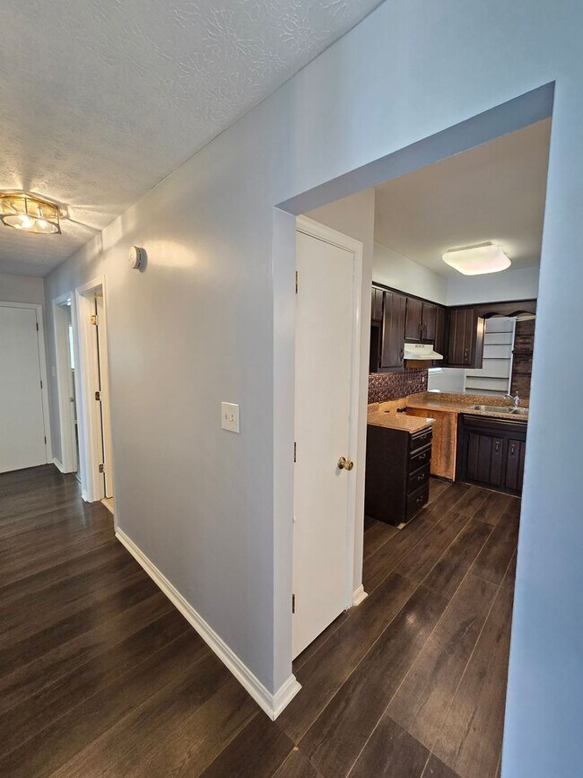 Building Photo - Brick Ranch in the heart of Jeffersontown! Featuring hardwood styled floors, 3 Bedrooms, 1.5 Bath...